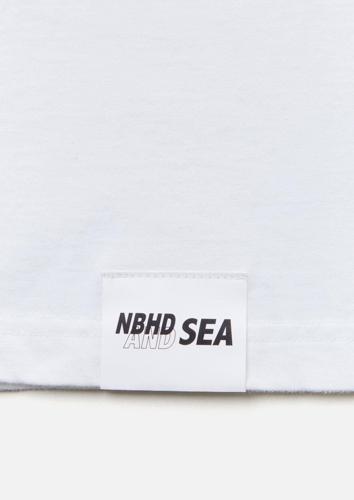 NH X WIND AND SEA . TEE SS-1