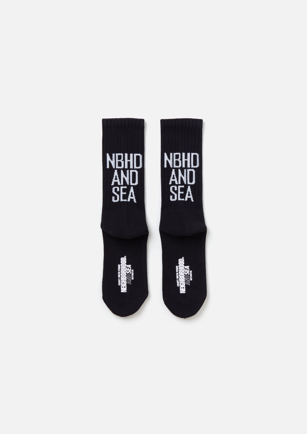 NH X WIND AND SEA . LOGO SOCKS